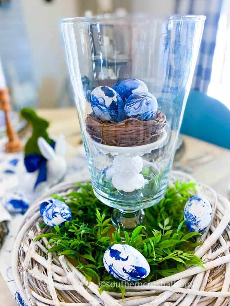 blue and white marbled eggs in vase