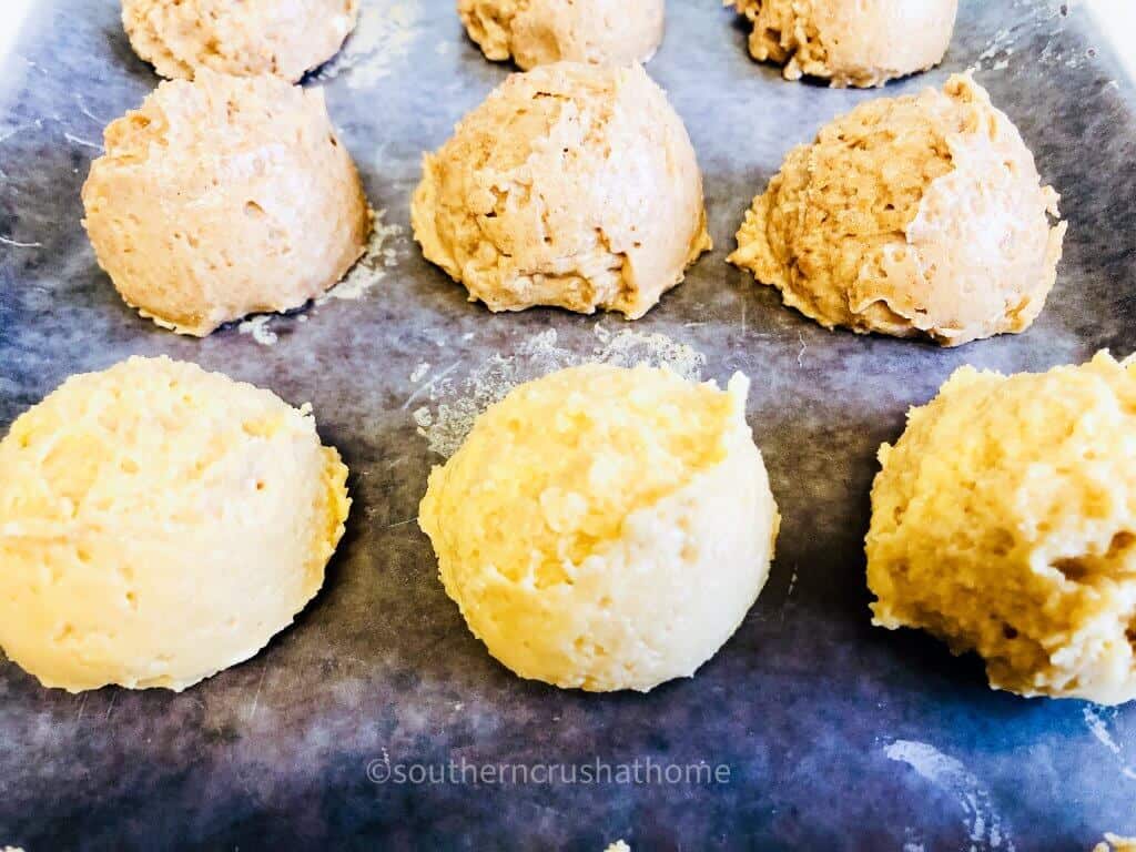 bunny tail oreo truffles on cookie sheet