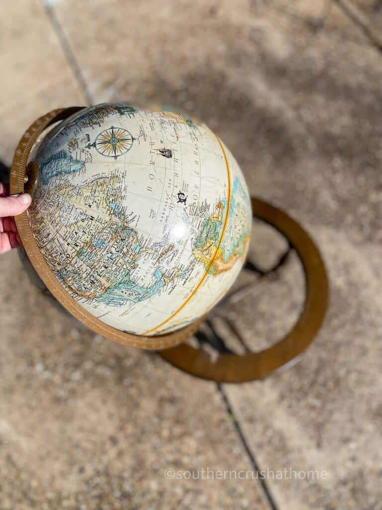 separate globe from wooden base