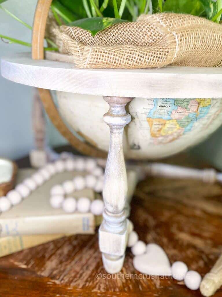 thrift store globe with bleached wood