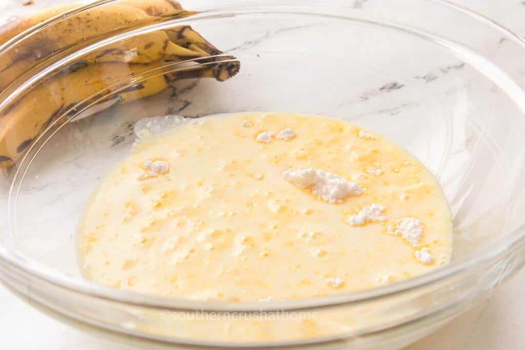 whisking milk and banana pudding