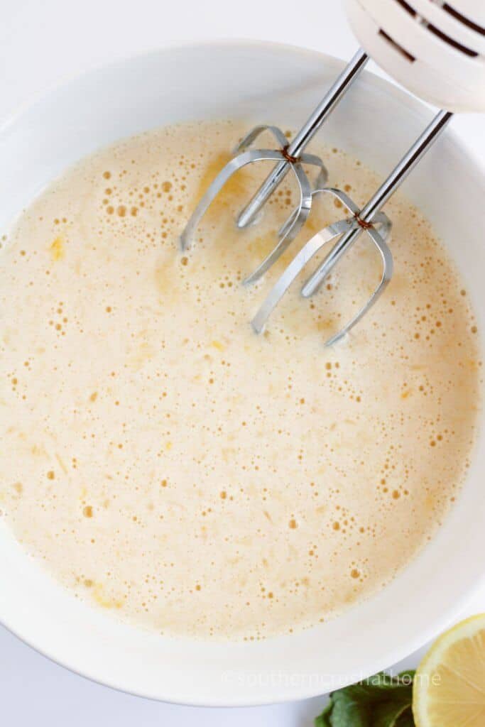 mixing ingredients for lemon bars