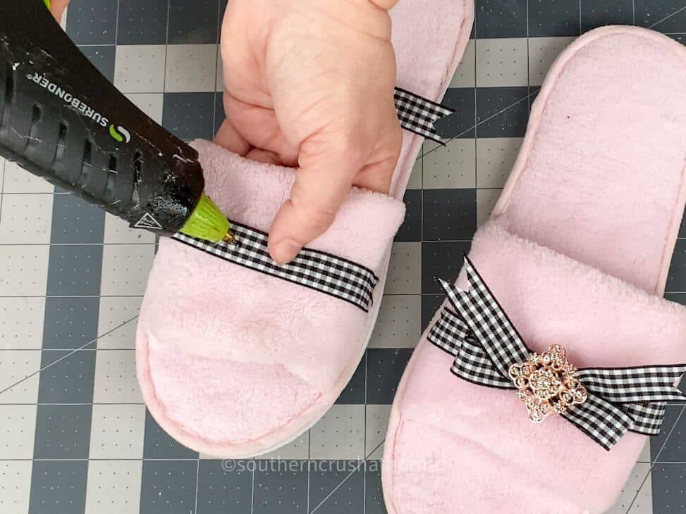 adding ribbon to slippers