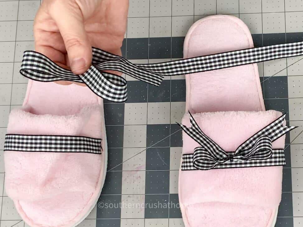 adding ribbon to slippers