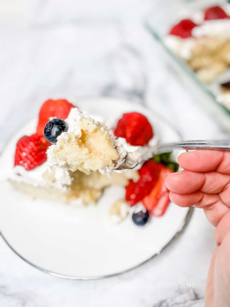 taking a bite out of poke cake
