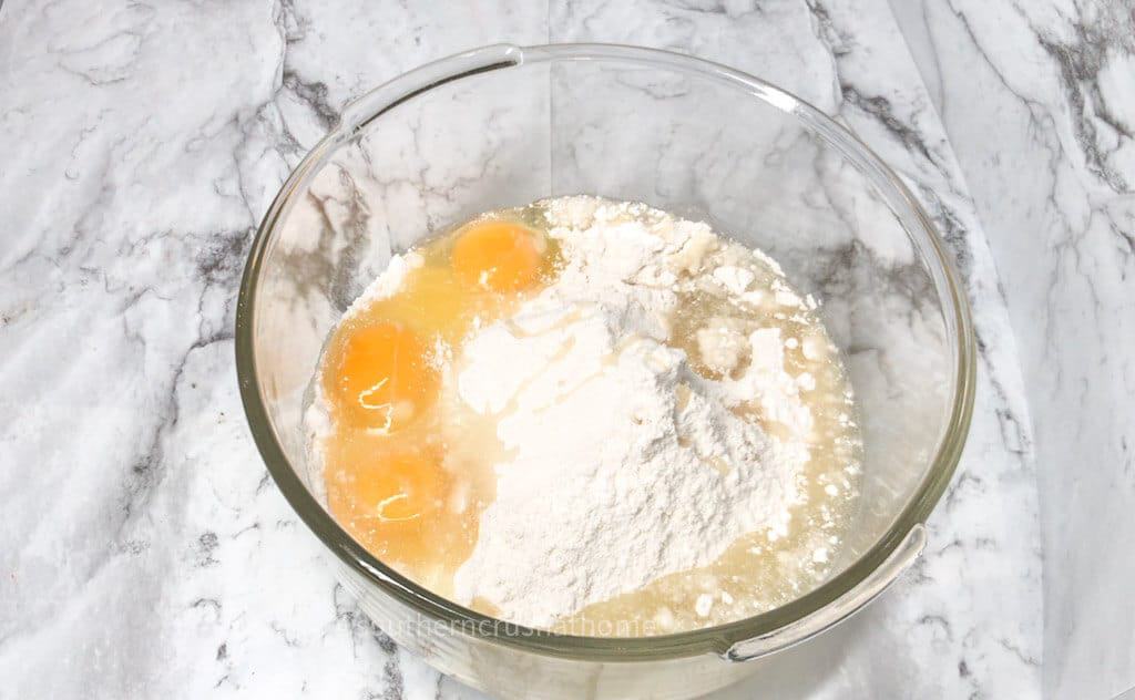 mixing ingredients for American flag poke cake