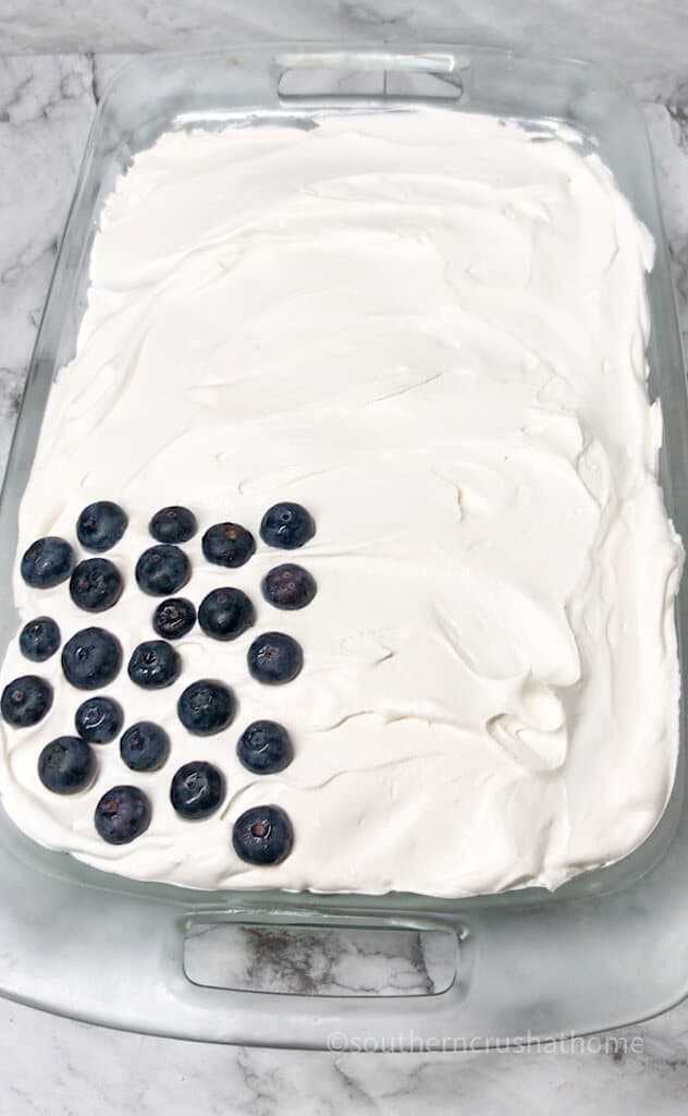 blueberries on american flag poke cake