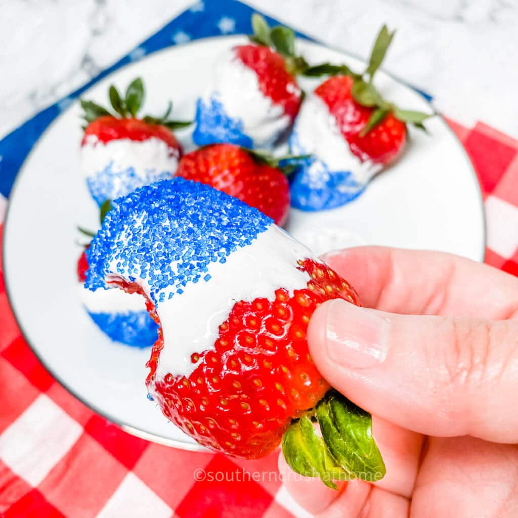 strawberry with bite taken out of it