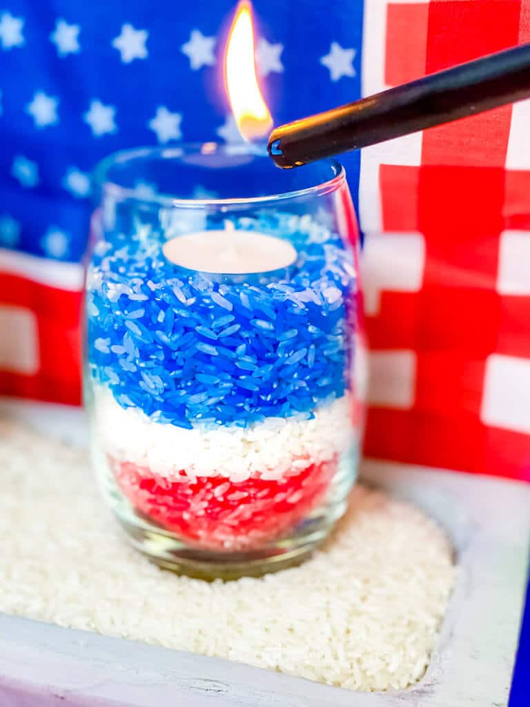 lighting patriotic candle