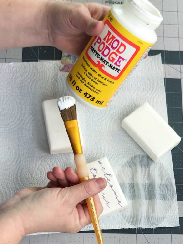 applying mod podge to soap