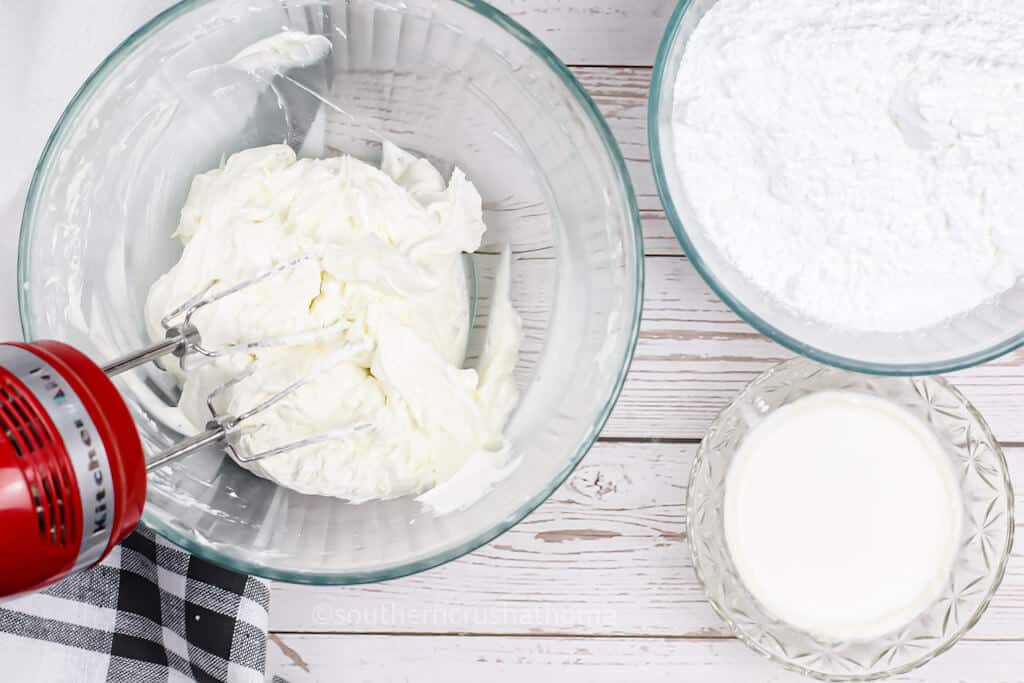 mixing vanilla buttercream frosting