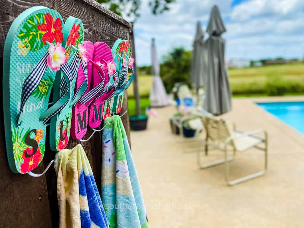 summer pool towel rack poolside