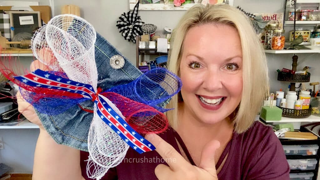 Melanie Ferguson holding a mesh ribbon bow