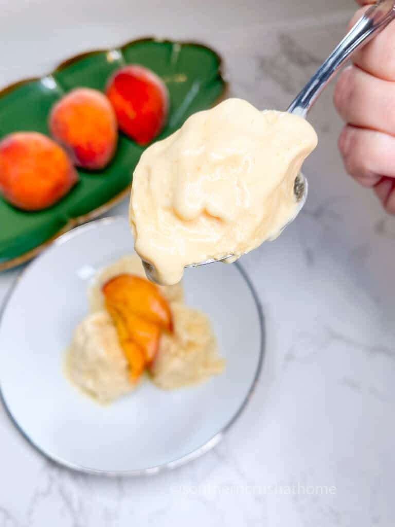 spoonful of peach ice cream