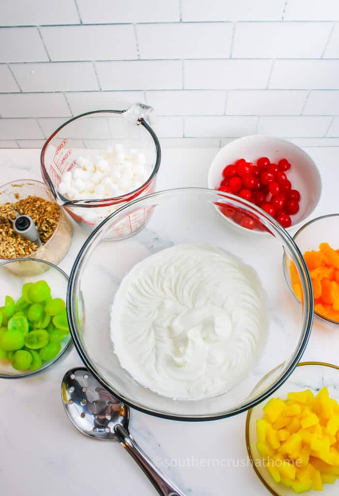 whipped mixture in clear glass bowl