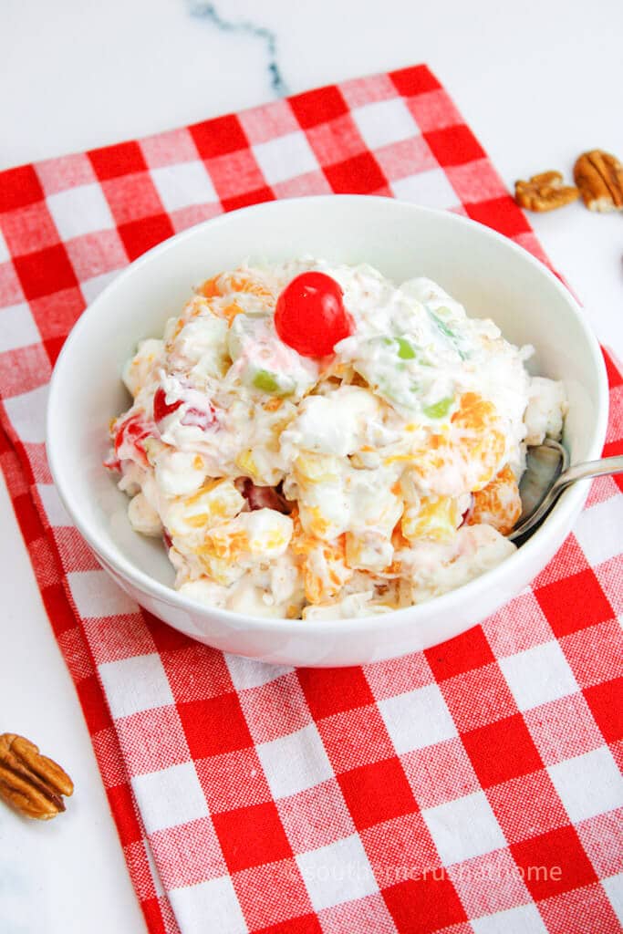 ambrosia salad on red and white checked towel