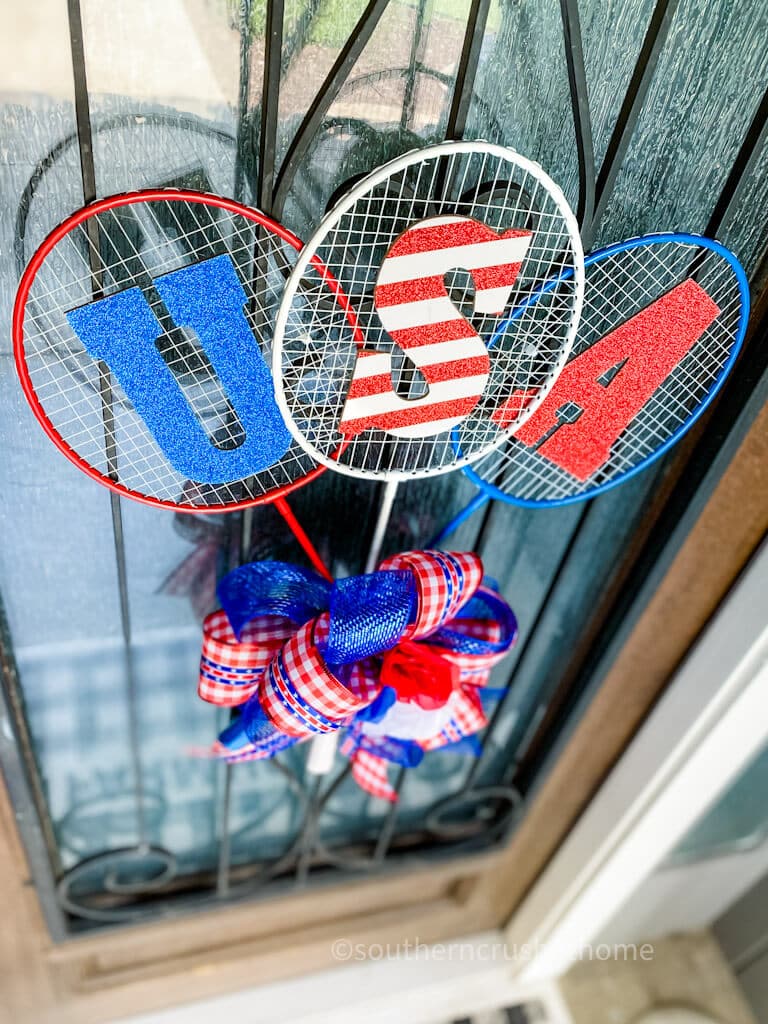 angle view of badminton rackets summer wreath