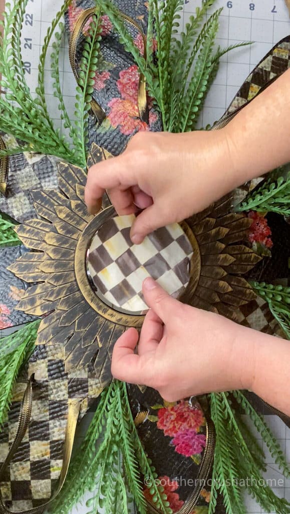 adding tissue paper to center of wreath