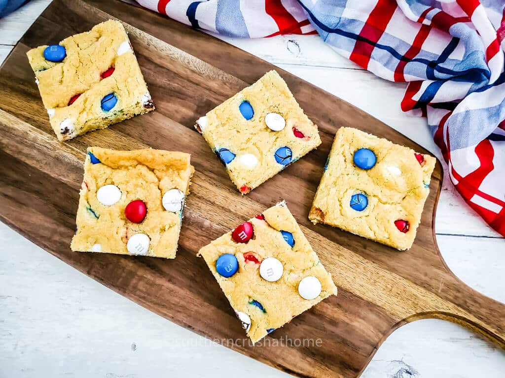 sugar cookie bars on cutting board