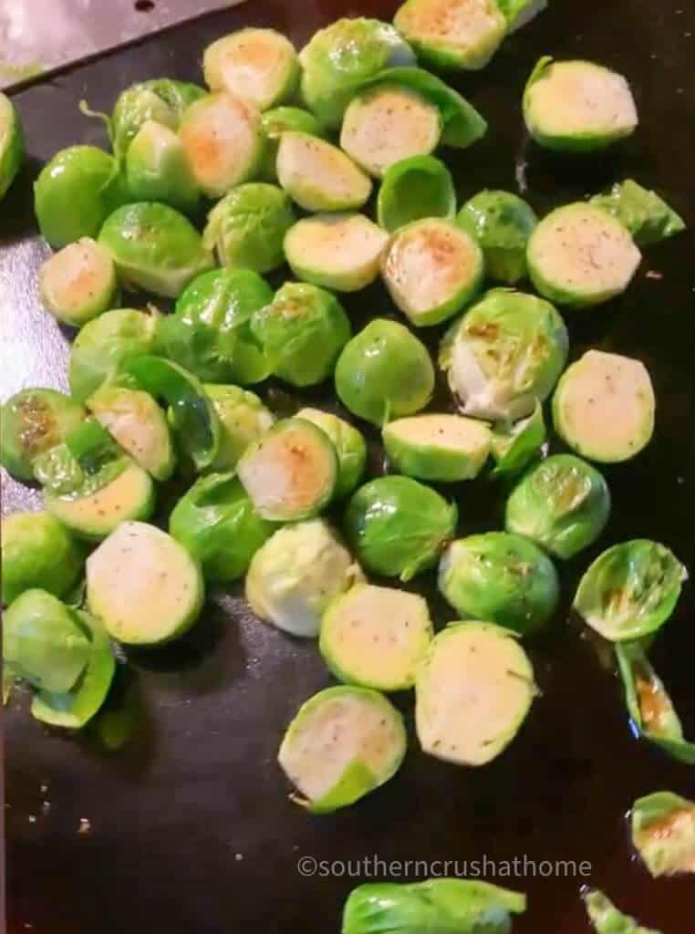 Brussel sprouts cooking on Blackstone griddle