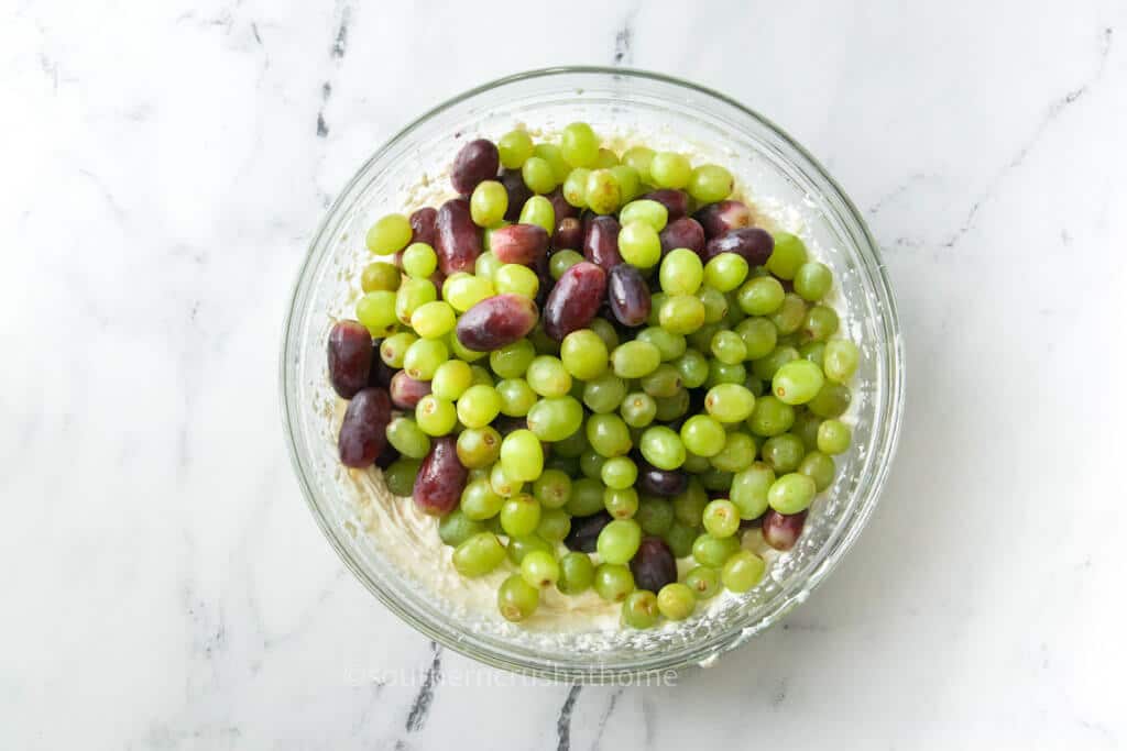 bowl of green and purple grapes