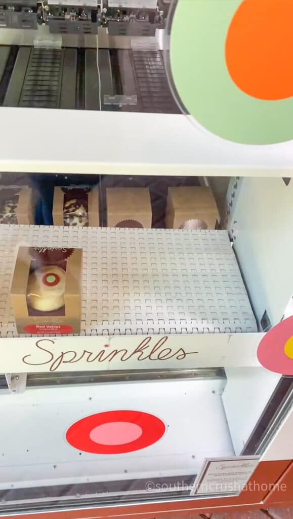 Sprinkles cupcake being served from cupcake vending machine