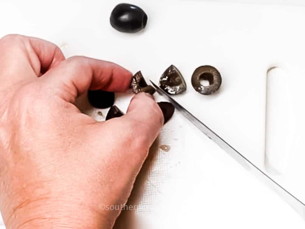 slicing black olives