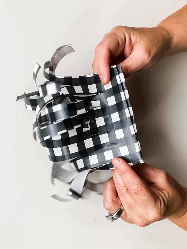 cutting wrapping paper strips