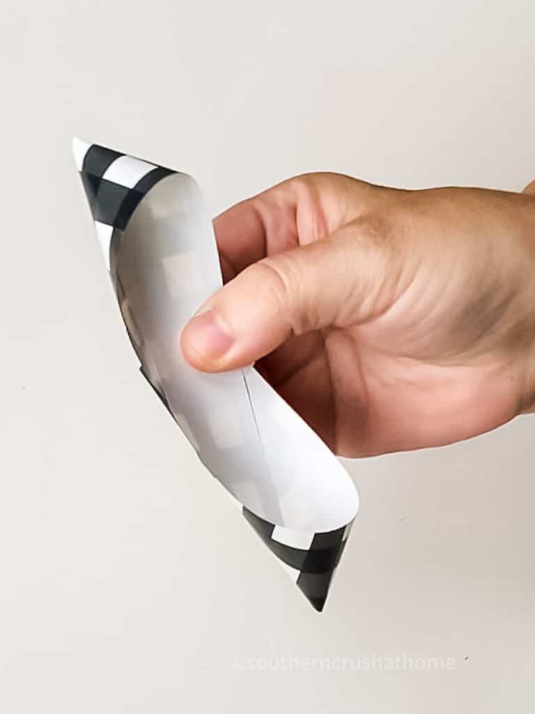 folded ends of a paper bow