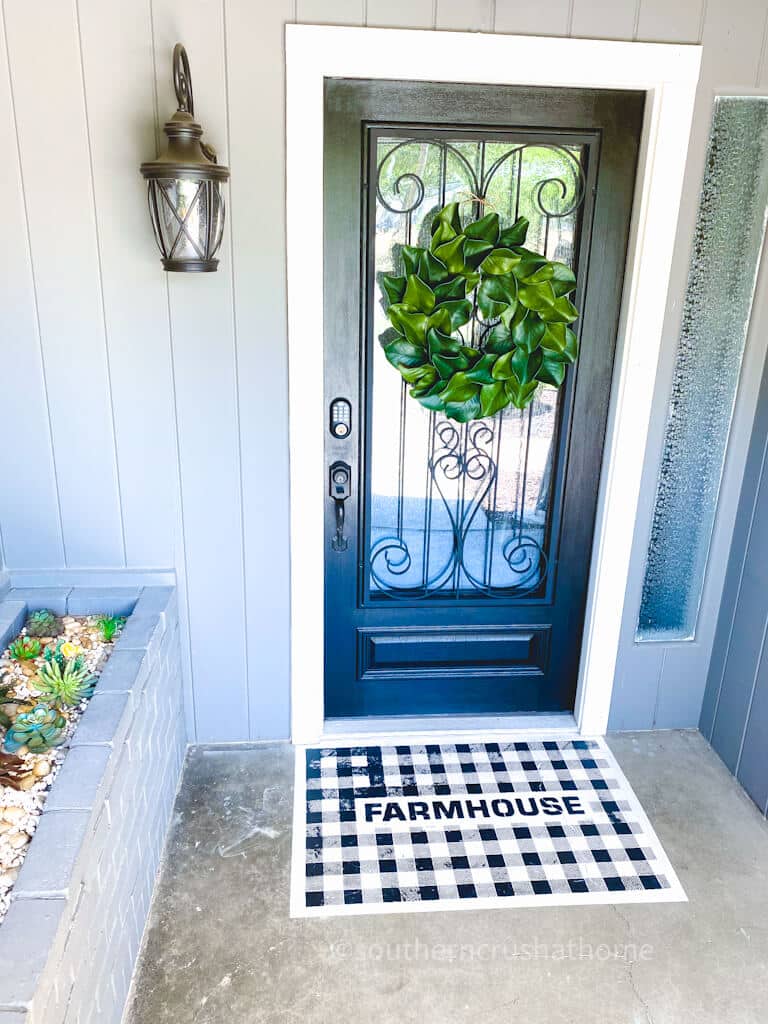 final front door with magnolia wreath