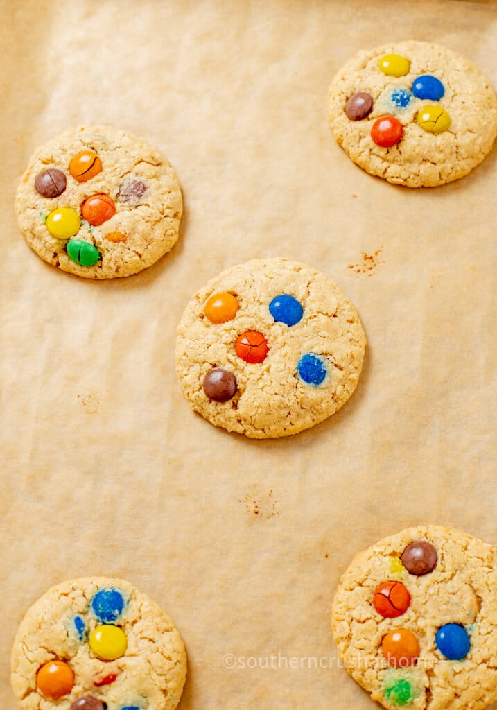 m&m cookies on parchment paper