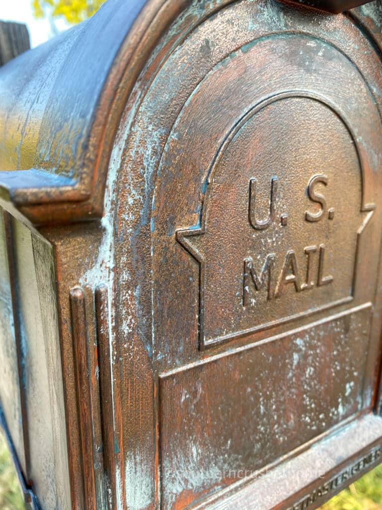 close up of front of patina mailbox