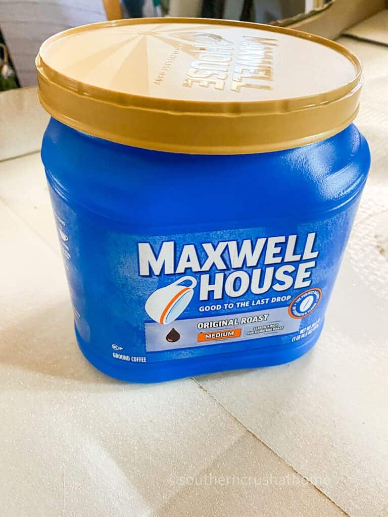 empty maxwell house coffee plastic can
