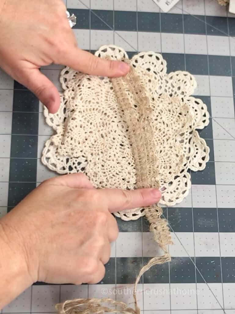 adding burlap trim to doily bow