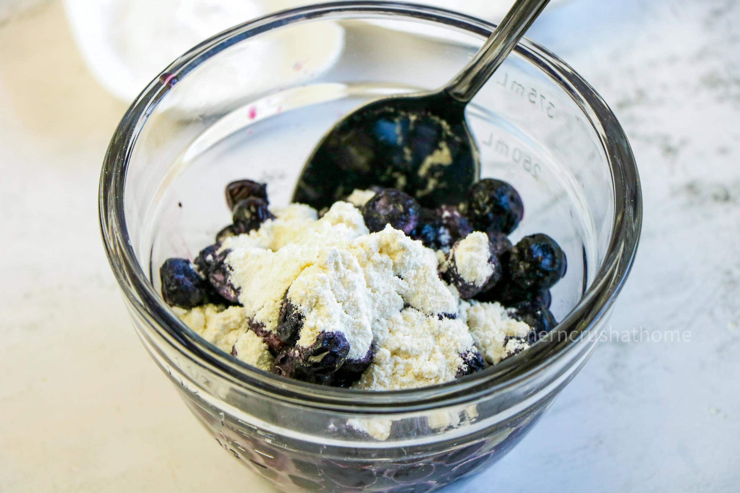 folding in blueberries