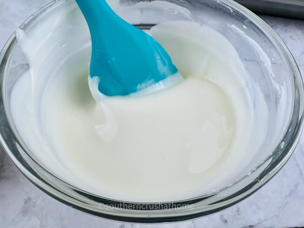 stirring melted white chocolate