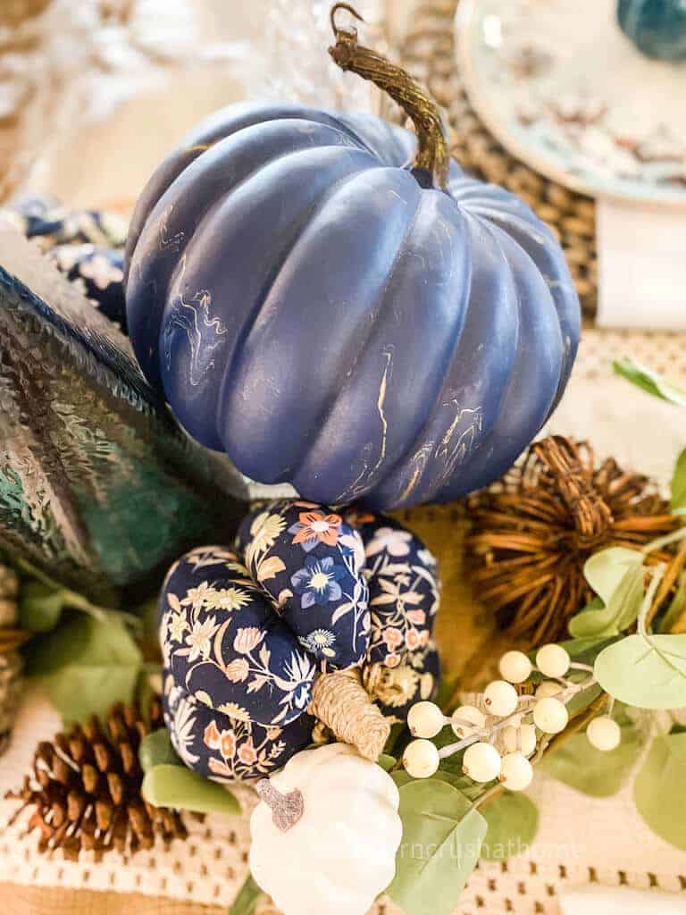 close up of navy marbled pumpkin centerpiece