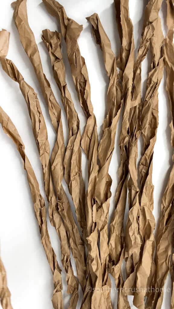 crumpled and twisted kraft paper strips