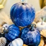 stack of blue pumpkins