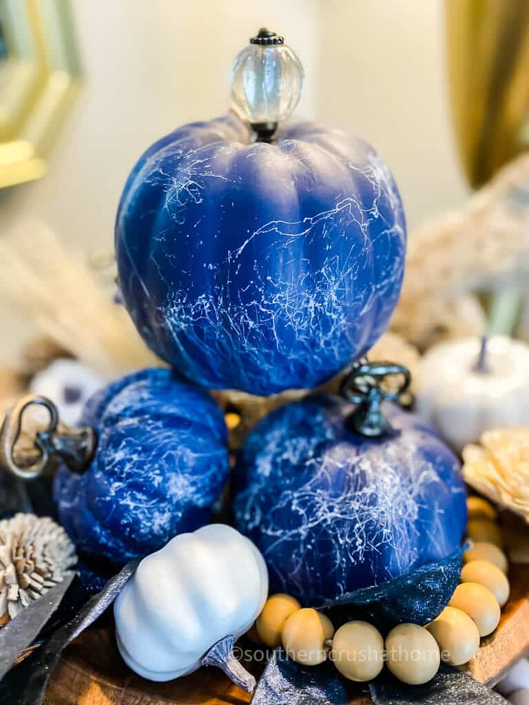 stack of blue pumpkins