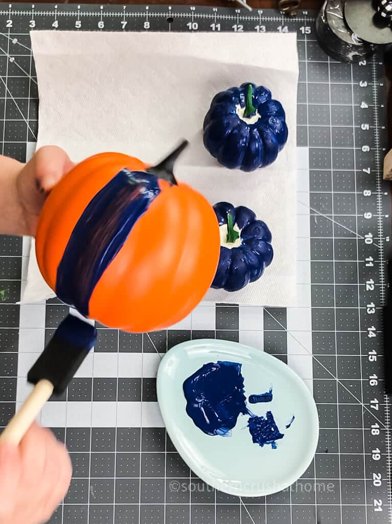 painting orange pumpkin blue