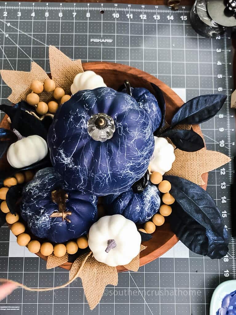 blue pumpkins in dough bowl