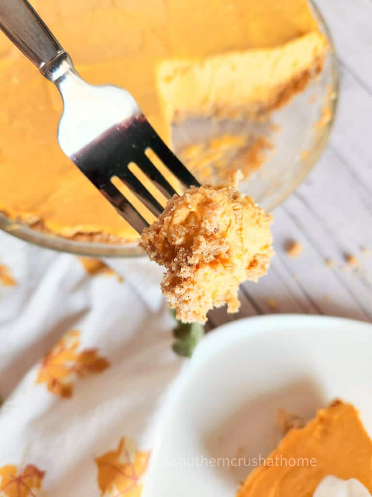 pumpkin pie cheesecake on a fork