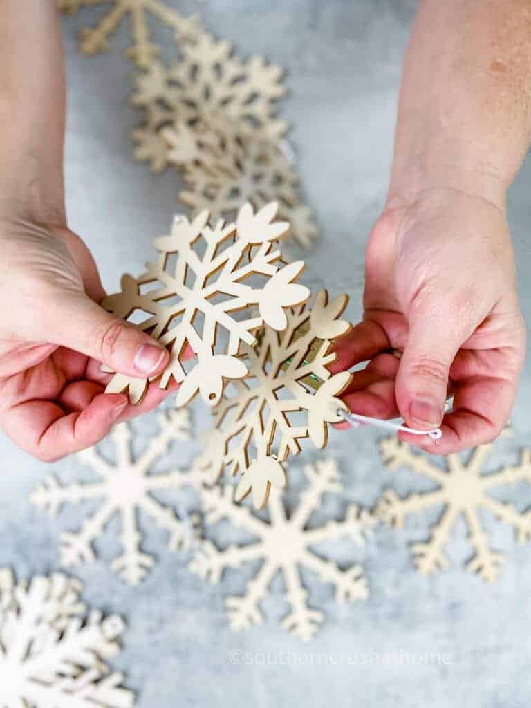 separating wooden snowflakes