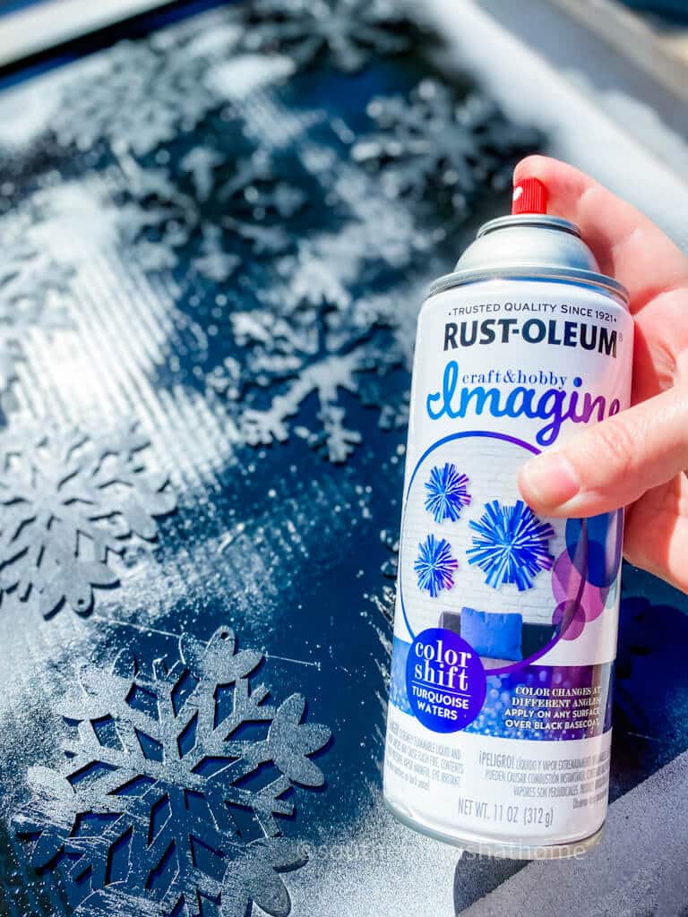 spray paint black snowflakes