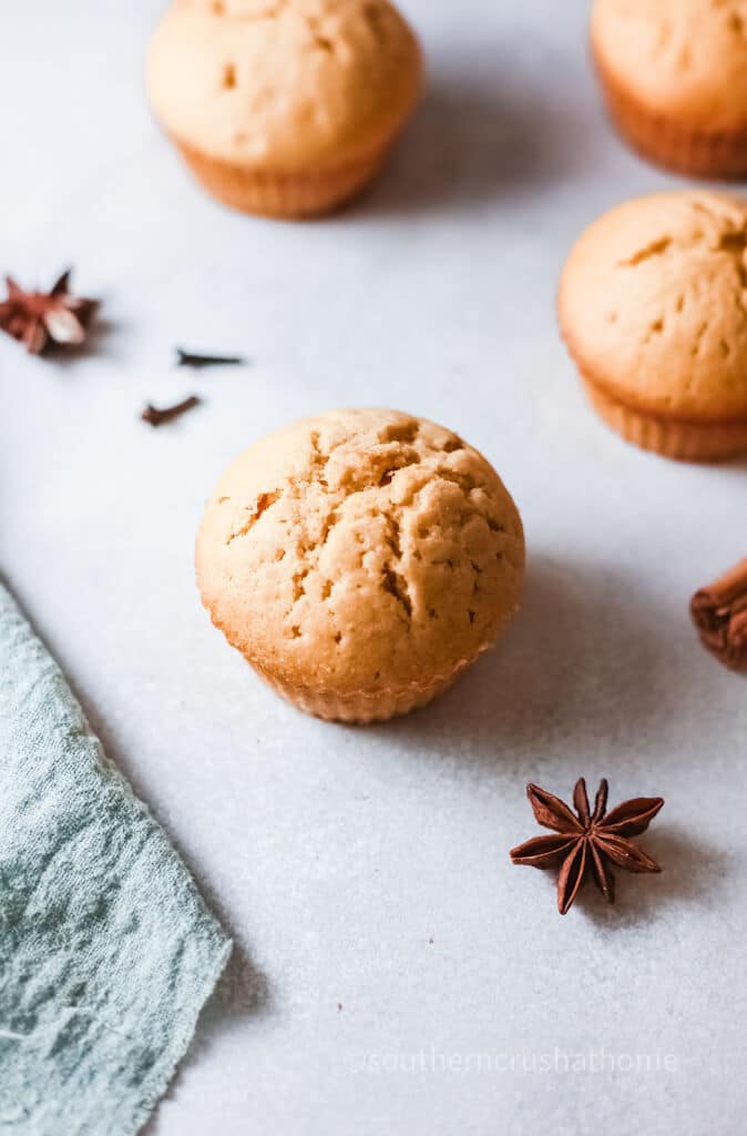 close up of pumpkin muffins with star of anise