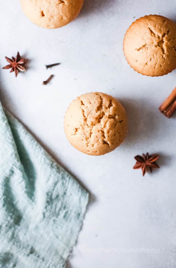 pumpkin muffins layed out by towel