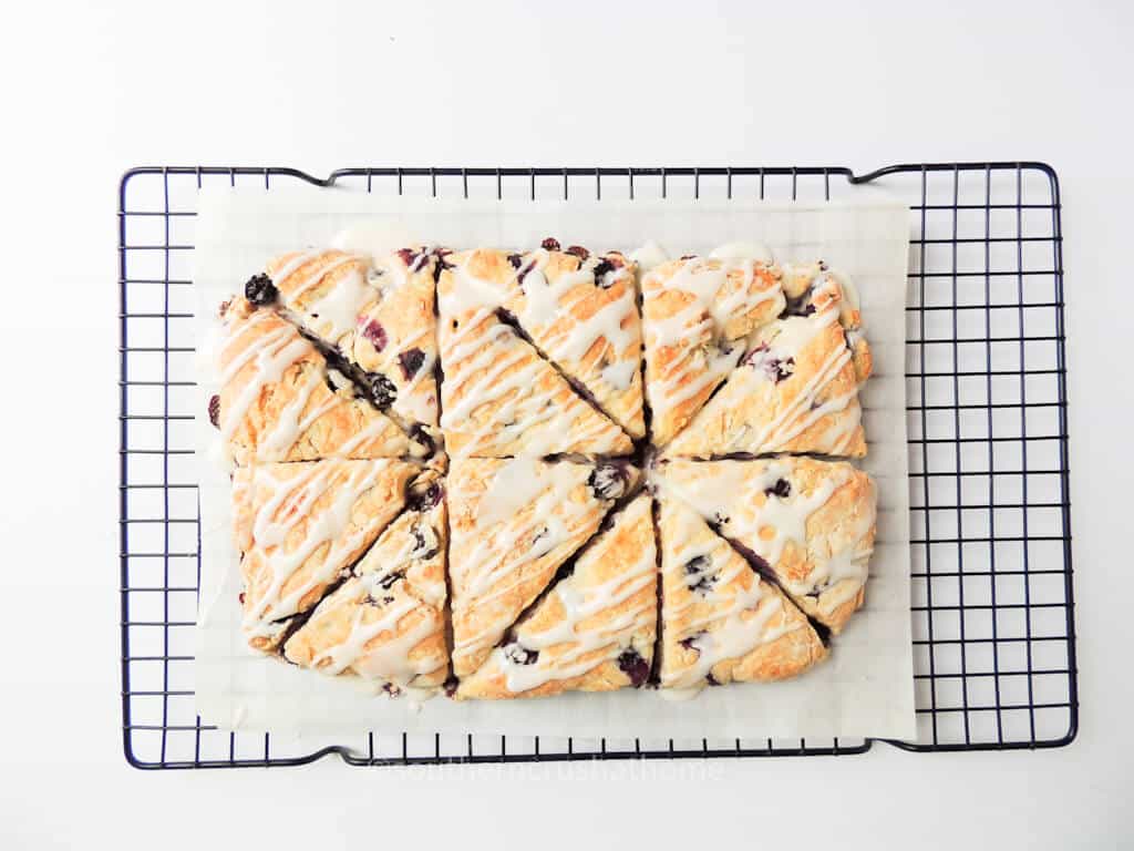 baked blueberry scones on cooling rack
