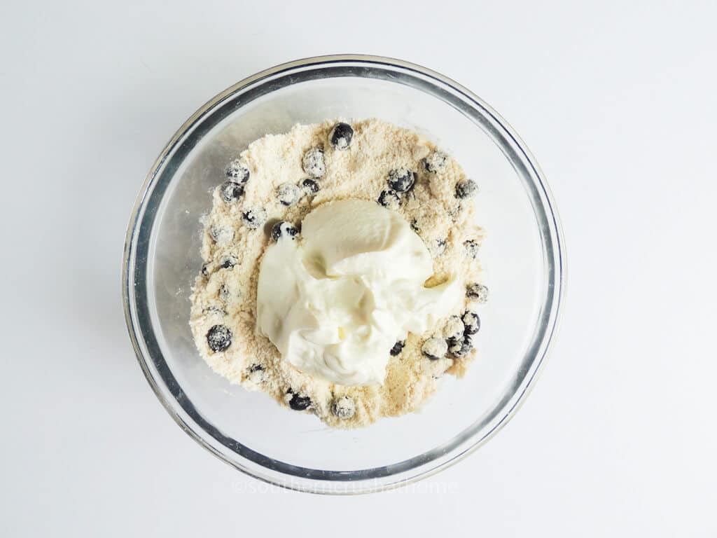 mixing blueberry scone dough