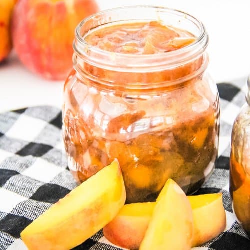 peach jam in a mason jar